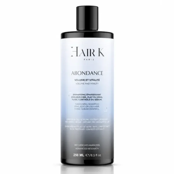 Shampoing volume Abondance Hair K Paris formulé pour apporter densité, volume et vitalité aux cheveux fins, plats ou en manque de matière.
